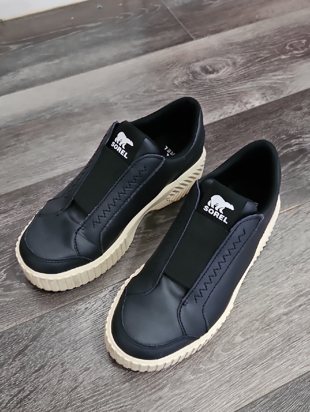SOREL Black Slip-On Sneakers with Cream Sole